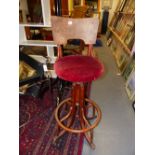 AN UNUSUAL VINTAGE THONET BENTWOOD ADJUSTABLE SWIVEL SEAT HIGHCHAIR/STOOL WITH PAPER LABEL.