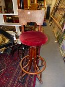 AN UNUSUAL VINTAGE THONET BENTWOOD ADJUSTABLE SWIVEL SEAT HIGHCHAIR/STOOL WITH PAPER LABEL.