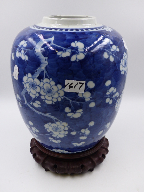 A CHINESE BLUE AND WHITE LARGE PRUNUS DECORATED GINGER JAR WITH DOUBLE ENCIRCLES FOUR CHARACTER MARK
