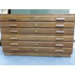 A VINTAGE OAK TWO PART SIX DRAWER ARTIST'S PLAN CHEST. H.87, W.145, D.90cms.