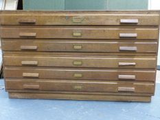 A VINTAGE OAK TWO PART SIX DRAWER ARTIST'S PLAN CHEST. H.87, W.145, D.90cms.