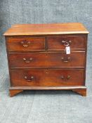 A GEORGIAN AND LATER SMALL FOUR DRAWER CHEST WITH MOULDED EDGE TOP AND CUT OUT BRACKET FEET. H.