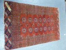 AN ANTIQUE BOKHARA RUG. 185 x 120cms.