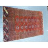 AN ANTIQUE BOKHARA RUG. 185 x 120cms.