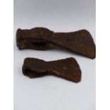 TWO EARLY HAND WROUGHT, IRON AXE HEADS.