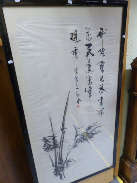 A 20th.C.JAPANESE SCHOOL, BAMBOO SIGNED AND INSCRIBED INK WASH DRAWING. 137 x 70cms.