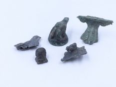 VARIOUS ROMAN ARTIFACTS TO INCLUDE A LEAD COCKEREL, A VINE LEAF AND HORSE HEAD PENDANT, A CAST