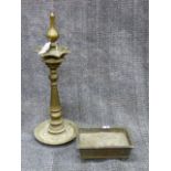A HEAVY BRONZE INDIAN CEREMONIAL TALL TAPERED FORM OIL LAMP. (H.62cms) TOGETHER WITH AN UNUSUAL