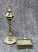 A HEAVY BRONZE INDIAN CEREMONIAL TALL TAPERED FORM OIL LAMP. (H.62cms) TOGETHER WITH AN UNUSUAL