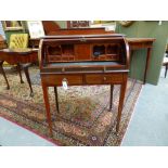 AN INLAID MAHOGANY EDWARDIAN CYLINDER BUREAU OF SHERATON DESIGN WITH FITTED INTERIOR AND TWO