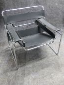 A WASSILY DESIGN CHROME AND LEATHER ARMCHAIR.