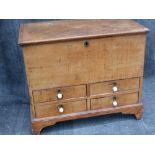 A 19th.C.COUNTRY PINE BLANKET CHEST WITH RISING TOP OVER FOUR SHORT DRAWERS ON BRACKET FEET. W.