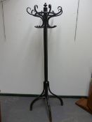 A VINTAGE THONET TYPE BENTWOOD HAT AND COAT STAND. H.212cms.