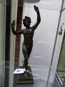 A PATINATED GRAND TOUR BRONZE FIGURE OF THE DANCING FAUN AFTER THE ANTIQUE. H.37cms.