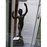 A PATINATED GRAND TOUR BRONZE FIGURE OF THE DANCING FAUN AFTER THE ANTIQUE. H.37cms.