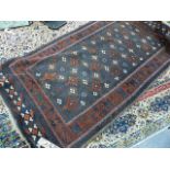 AN ANTIQUE BELOUCH RUG. 212 x 113cms.