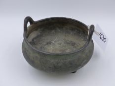 A CHINESE BRONZE TWIN HANDLED TRIFID FOOTED CENSER WITH IMPRESSED SIX CHARACTER MARKS TO BASE. D.