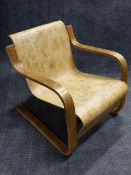 A VINTAGE ALVAR AALTO DESIGNED CANTILEVER CHAIR, #31 MOULDED PLYWOOD,AND LABELLED FINMAR, LONDON.