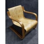A VINTAGE ALVAR AALTO DESIGNED CANTILEVER CHAIR, #31 MOULDED PLYWOOD,AND LABELLED FINMAR, LONDON.