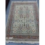 A PERSIAN RUG OF GARDEN DESIGN. 188 x 129cms.