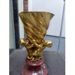 EARLY 20th.C. SCHOOL. THREE SEA SPRITES SUPPORTING A SHELL, GILT BRONZE ON MARBLE BASE. OVER ALL