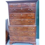 A MAHOGANY GEORGIAN CHEST ON CHEST WITH DENTAL CORNICE ABOVE TWO SHORT DRAWERS AND THREE LONG