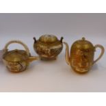 THREE PIECES OF JAPANESE SATSUMA, TWO SMALL TEAPOTS AND A COVERED KORO, ALL EXTENSIVELY DECORATED