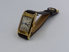 A 9ct GOLD OMEGA WATCH. THE CASE IS HALLMARKED BIRMINGHAM AND DATED 1934, MAKERS MARK A.L.D