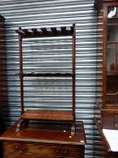 A 19th.C.MAHOGANY COUNTRY HOUSE RIDING BOOT RACK WITH TURNED SUPPORTS.