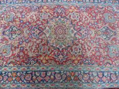 A PERSIAN TABRIZ RUG. 208 x 128cms.