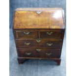 A SMALL INLAID WALNUT GEORGIAN SLANT FRONT BUREAU WITH FITTED INTERIOR AND TWO SHORT DRAWERS OVER