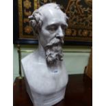 A TINTED PLASTER BUST OF CHARLES DICKENS AFTER WOOLNER. H.66cms.