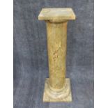 AN ANTIQUE ARCHITECTURAL FORM PEDESTAL WITH FAUX MARBLE DECORATION. H.107cms.