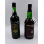 TAYLORS SPECIAL RUBY PORT AND A BOTTLE OF COCKBURNS PORT.