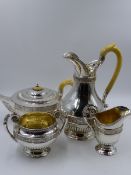 A SILVER FOUR PIECE TEASET COMPRISING A TEAPOT, HOT WATER POT, TWO HANDLED SUCRIER AND CREAM JUG.