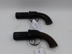 TWO 19TH CENTURY SIX SHOT PEPPERBOX PERCUSION REVOLVERS UNSIGNED, EACH WITH WOOD GRIPS AND SCROLL