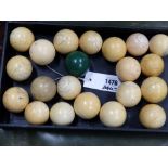 A COLLECTION OF EIGHTEEN ANTIQUE IVORY SNOOKER BALLS AND THREE OTHERS.