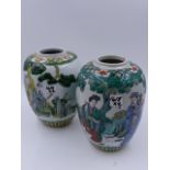 TWO CHINESE FAMILLE VERTE DECORATED OVOID JARS WITH FIGURAL DECORATION. H.17cms.