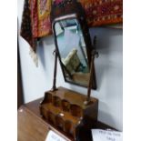 A WALNUT GEORGIAN AND LATER DRESSING TABLE MIRROR WITH MULTI DRAWER, STEPPED BASE ON BUN FEET AND