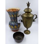 A FINELY ENGRAVED INDIAN BRASS TWIN HANDLES COVERED URN, H.40cms TOGETHER WITH A FIGURAL COPPER BOWL