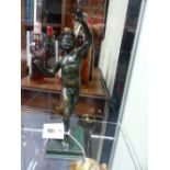 AN ANTIQUE GRAND TOUR BRONZE OF THE DANCING FAUN AFTER THE ANTIQUE. H.30cms.