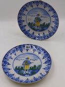 A PAIR OF ANTIQUE FAIENCE POTTERY PLATES DECORATED WITH HAND PAINTED FIGURES LECAPITANT SPERVA