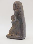 AN INTERESTING EARLY EGYPTIAN POTTERY FIGURE OF KNEELING FEMALE WITH CHILD ON LAP. ( PRIVATE SPANISH