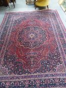 AN ANTIQUE PERSIAN CARPET OF CLASSICAL DESIGN. 336 x 250cms.