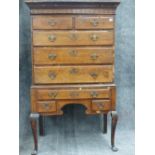 A LATE GEORGIAN OAK CHEST ON STAND WITH CONFIGURATION OF BLIND FRIEZE DRAWER OVER TWO SHORT, THREE