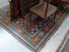 A PAIR OF ANTIQUE PERSIAN RUGS OF CAUCASIAN DESIGN. 170x112cms.