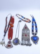 SIX PIECES OF VARIOUS NORTH AFRICAN TRIBAL JEWELLERY.