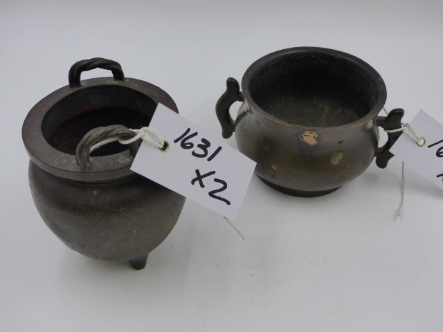 TWO CHINESE BRONZE TWIN HANDLE CENSERS, ONE WITH FLARED RIM AND SIDE HANDLES (H.7cms), THE OTHER