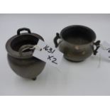 TWO CHINESE BRONZE TWIN HANDLE CENSERS, ONE WITH FLARED RIM AND SIDE HANDLES (H.7cms), THE OTHER