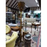 AN ART DECO WALNUT FLOOR LAMP OR UPLIGHTER WITH CARVED GILT COLLAR, TAPERED FORM WITH OCTAGONAL